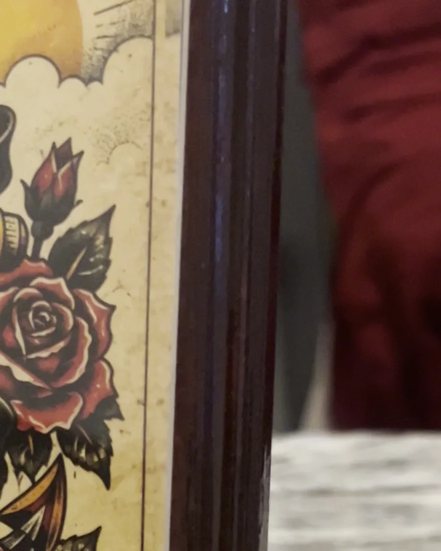Close-up of the routed, stained and varnished edge of a cherry board